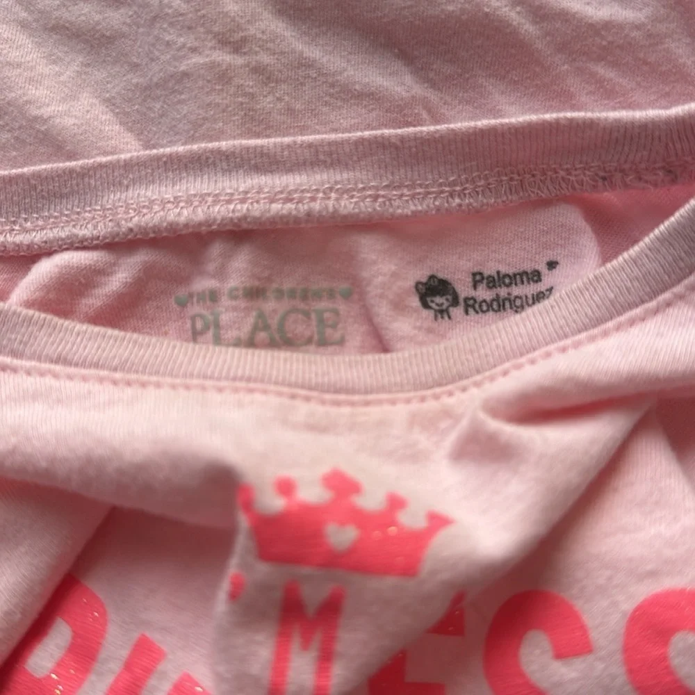 The Children’s Place Paloma Rodriguez pink sparkle graphic short sleeve tee.